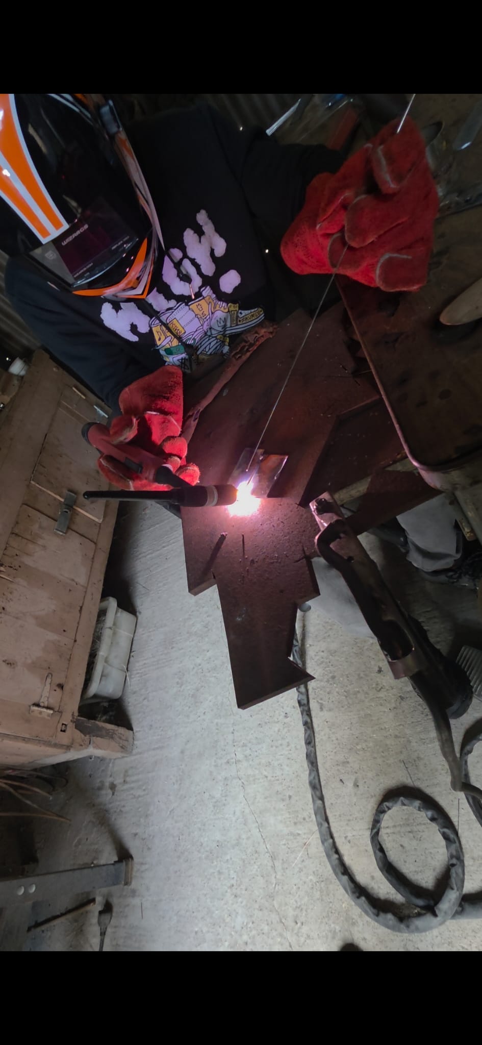 Student TIG or MIG welding close-up
