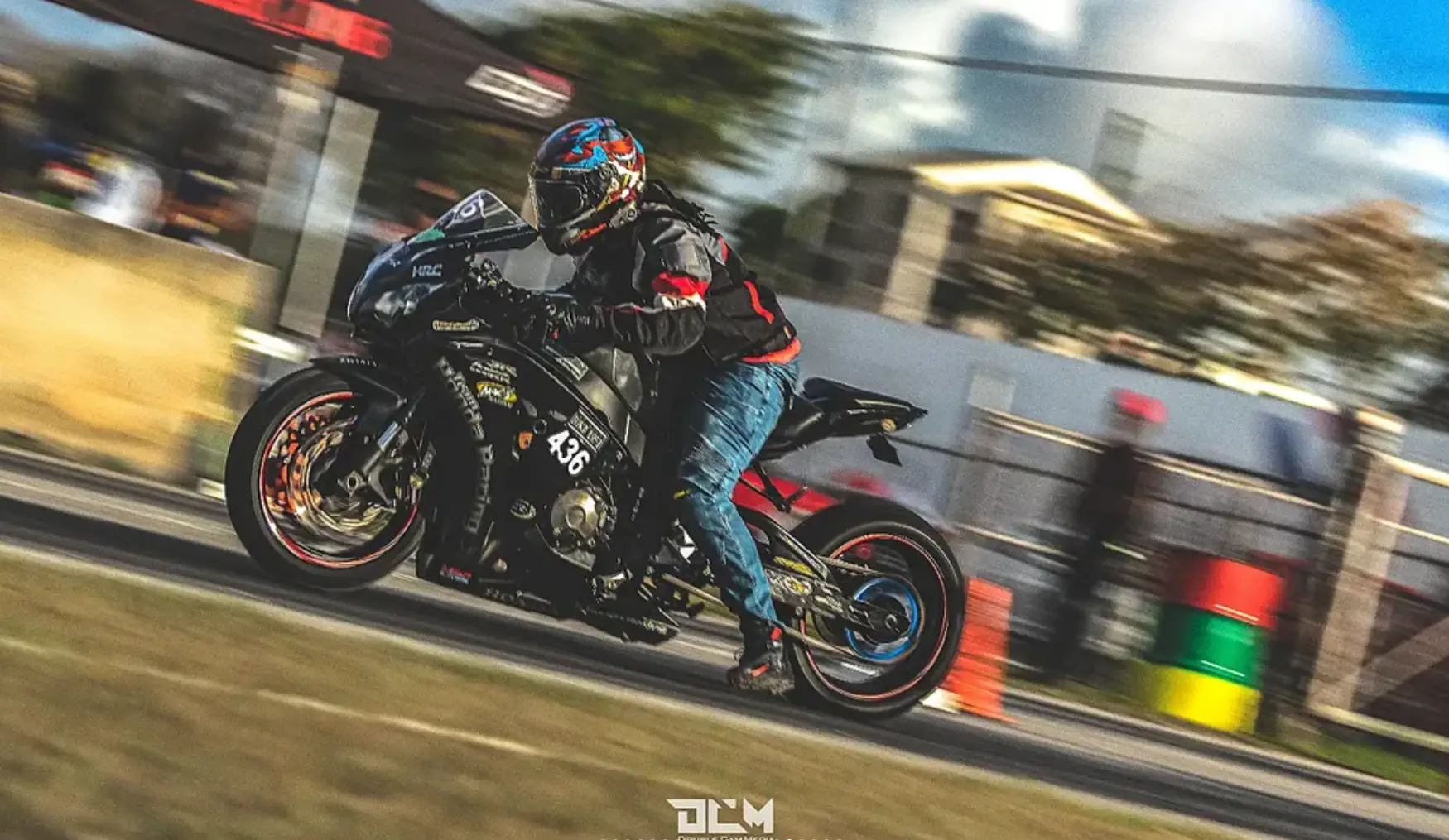 Motorcycle launching in a drag race